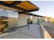 Mid-century modern patio with sliding glass doors and mountain view at 7724 E Long Rifle Rd, Carefree, AZ 85377