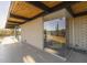 Mid-century modern patio with large window and mountain view at 7724 E Long Rifle Rd, Carefree, AZ 85377