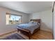 Bright bedroom with wood floors and city views at 7930 E Camelback Rd # 509, Scottsdale, AZ 85251