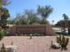 Scottsdale Shadows community entrance sign with landscaping at 7930 E Camelback Rd # 509, Scottsdale, AZ 85251