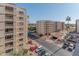 Exterior view of building with parking and landscaping at 7930 E Camelback Rd # 509, Scottsdale, AZ 85251