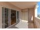 View from the balcony showing the kitchen inside the home and the blue skies outside at 7930 E Camelback Rd # 509, Scottsdale, AZ 85251