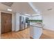 Modern kitchen featuring stainless steel appliances, center island, and white cabinets at 7930 E Camelback Rd # 509, Scottsdale, AZ 85251