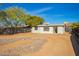 Large backyard with gravel and desert landscaping at 8215 E 2Nd Ave, Mesa, AZ 85208