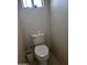 Small bathroom with toilet and tiled floor at 8501 W Vernon Ave, Phoenix, AZ 85037