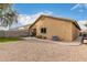 Large backyard with gravel and AC unit at 851 E Bradstock Way, San Tan Valley, AZ 85140