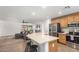 Modern kitchen with an island and stainless steel appliances at 851 E Bradstock Way, San Tan Valley, AZ 85140