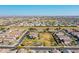 Aerial view of a new home community with a playground at 8539 W Lamar Rd, Glendale, AZ 85305