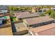 Aerial view of homes, showcasing a backyard with a firepit at 8539 W Lamar Rd, Glendale, AZ 85305