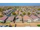 Aerial view of homes, showcasing a backyard with a patio at 8539 W Lamar Rd, Glendale, AZ 85305