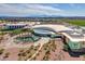 Aerial view of a resort with palm trees and a fountain at 8539 W Lamar Rd, Glendale, AZ 85305