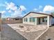 Spacious backyard with gravel and flagstone patio at 8539 W Lamar Rd, Glendale, AZ 85305