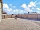 Spacious backyard with gravel landscaping and fire pit at 8539 W Lamar Rd, Glendale, AZ 85305