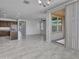 Open concept dining area with view of kitchen and living room at 8539 W Lamar Rd, Glendale, AZ 85305