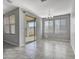 Bright dining area with sliding glass doors leading to the patio at 8539 W Lamar Rd, Glendale, AZ 85305