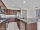 Modern kitchen with granite countertops and stainless steel appliances at 8539 W Lamar Rd, Glendale, AZ 85305