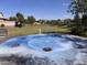 Community water feature with spray jets and a circular design at 8539 W Lamar Rd, Glendale, AZ 85305