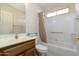 Clean bathroom with tub, shower and updated vanity at 9007 E Emerald Dr, Sun Lakes, AZ 85248