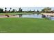 Gorgeous view of a peaceful golf course and lake at 9007 E Emerald Dr, Sun Lakes, AZ 85248