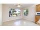 Bright kitchen nook with large windows and tile floors at 9007 E Emerald Dr, Sun Lakes, AZ 85248