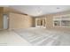 Living room with vaulted ceiling, carpet, and sliding glass doors at 9007 E Emerald Dr, Sun Lakes, AZ 85248