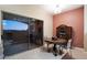 Bright dining area with a wooden table and access to a patio at 920 E Devonshire Ave # 4005, Phoenix, AZ 85014