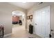 Well-lit hallway with access to living spaces and bedrooms at 920 E Devonshire Ave # 4005, Phoenix, AZ 85014