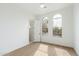 Bedroom with hardwood floors and a view of the backyard at 9248 E Desert Village Dr, Scottsdale, AZ 85255