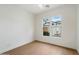 Bedroom with hardwood floors and a view of the pool at 9248 E Desert Village Dr, Scottsdale, AZ 85255