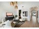 Bright living room with high ceilings, modern lighting, and neutral decor for a serene atmosphere at 9248 E Desert Village Dr, Scottsdale, AZ 85255