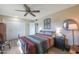 Cozy bedroom with a queen-sized bed and ample closet space at 9614 W Long Hills Dr, Sun City, AZ 85351