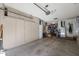 Garage with ample storage and shelving at 9614 W Long Hills Dr, Sun City, AZ 85351