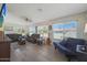 Light and airy living room with hardwood floors and ample natural light at 9614 W Long Hills Dr, Sun City, AZ 85351