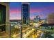 Night city view from a condo balcony with a rail at 1 E Lexington Ave # 908, Phoenix, AZ 85012