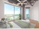 Bedroom with hardwood floors, city view and access to balcony at 1 E Lexington Ave # 908, Phoenix, AZ 85012