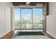 Bedroom with floor to ceiling windows and city view at 1 E Lexington Ave # 908, Phoenix, AZ 85012