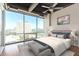 Spacious bedroom with city views and a king-size bed at 1 E Lexington Ave # 908, Phoenix, AZ 85012