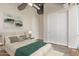 Bright bedroom with a queen-size bed and city view at 1 E Lexington Ave # 908, Phoenix, AZ 85012