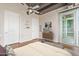 Bedroom with private balcony access and king-size bed at 1 E Lexington Ave # 908, Phoenix, AZ 85012