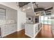 Modern kitchen with granite countertops and gray cabinets at 1 E Lexington Ave # 908, Phoenix, AZ 85012