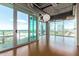 Open living area with hardwood floors and city views at 1 E Lexington Ave # 908, Phoenix, AZ 85012