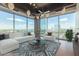 Spacious living room with city views and modern furniture at 1 E Lexington Ave # 908, Phoenix, AZ 85012