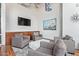 Relaxing lounge with comfy armchairs and a large TV at 1 E Lexington Ave # 908, Phoenix, AZ 85012