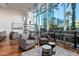 Spacious lounge with hardwood floors and city views at 1 E Lexington Ave # 908, Phoenix, AZ 85012