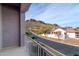 Balcony overlooking a residential street and mountains at 10164 E Dinosaur Ridge Rd, Gold Canyon, AZ 85118