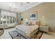 Comfortable bedroom with window seat and en-suite bathroom at 11127 E Mirasol Cir, Scottsdale, AZ 85255