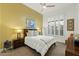 Charming bedroom with wood accents and window seating at 11127 E Mirasol Cir, Scottsdale, AZ 85255