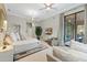 Spacious primary bedroom with large windows and sitting area at 11127 E Mirasol Cir, Scottsdale, AZ 85255