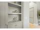 Custom built-in shelving and ample storage space at 11127 E Mirasol Cir, Scottsdale, AZ 85255