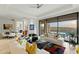Open living space with a view of the backyard, pool, and scenic landscape at 11127 E Mirasol Cir, Scottsdale, AZ 85255